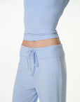 dusty blue high-rise wide-leg lounge pants, on model, full-length view