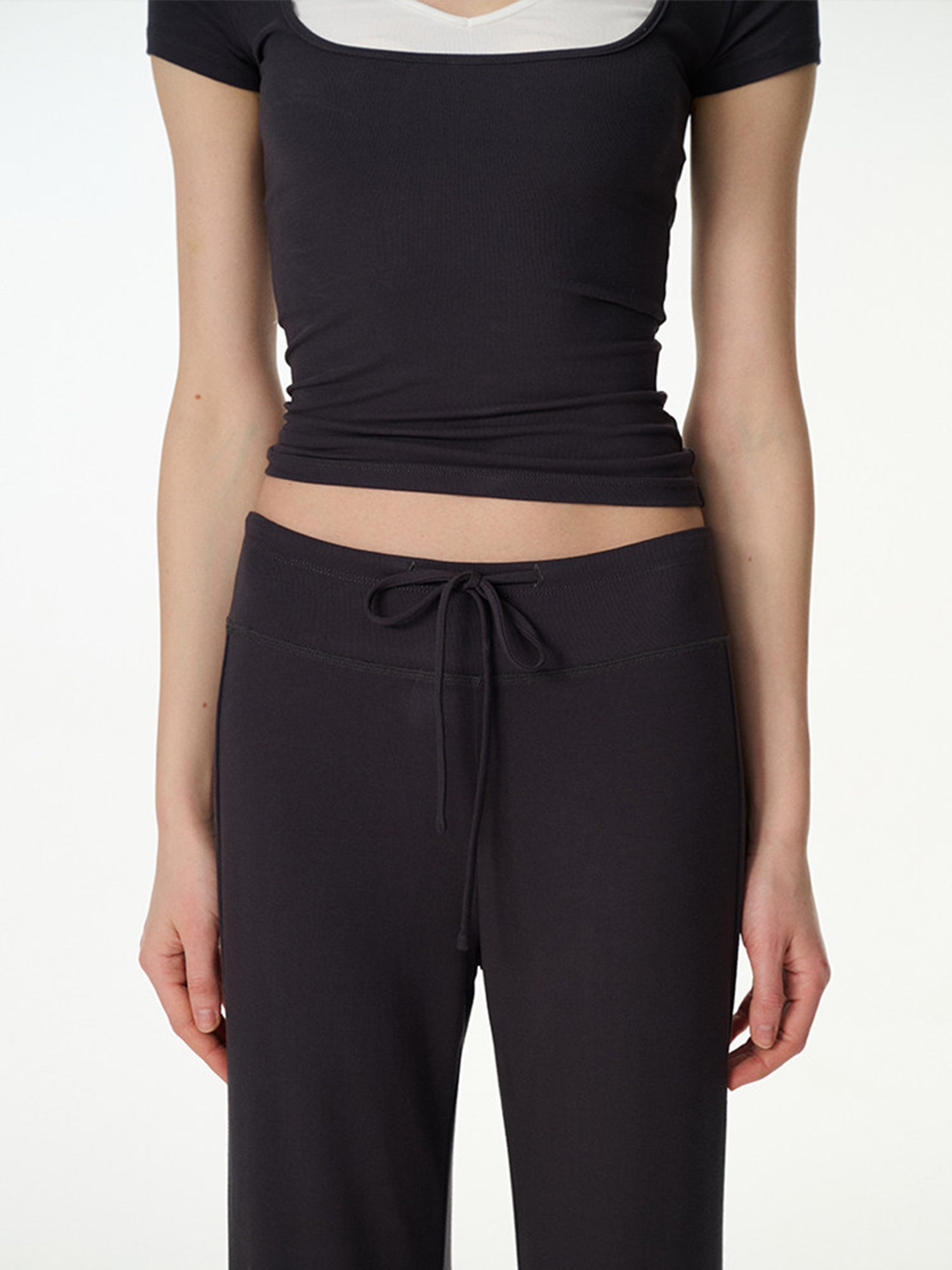 black high-rise wide-leg lounge pants, on model, styled view