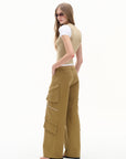 beige layered cropped short sleeve top, on model, side view