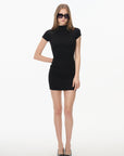 black mock neck fitted mini dress, on model, full-length view