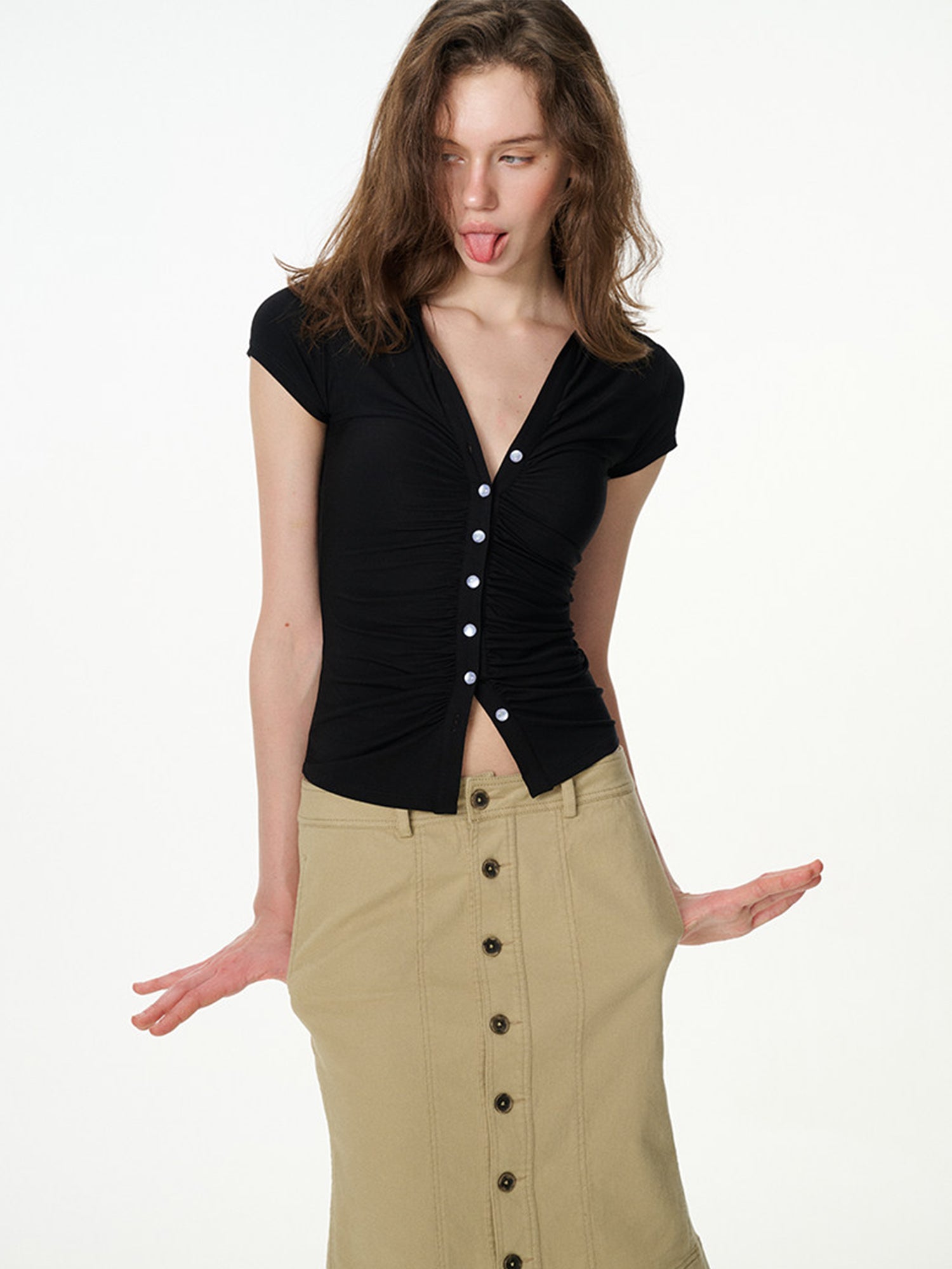 black ruched button-front short sleeve top, on model, styled view