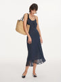 Polka-dot drawstring midi dress, full front view styled with tote